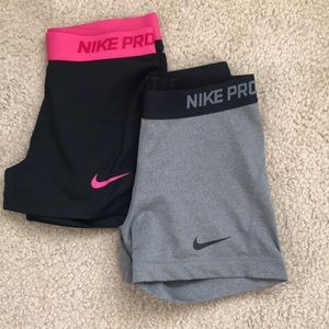 Two Nike Pro spandex shorts